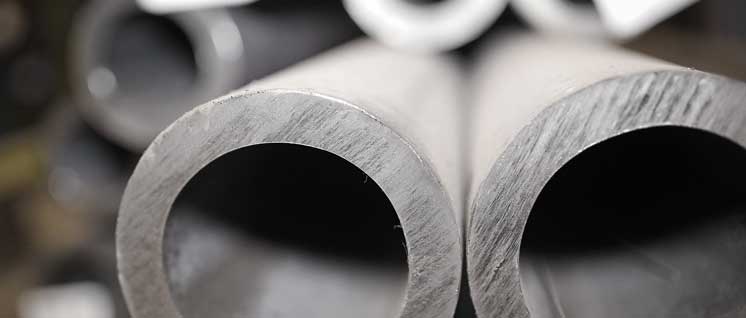 Hot-deformed seamless pipe stock for production of joint couplings